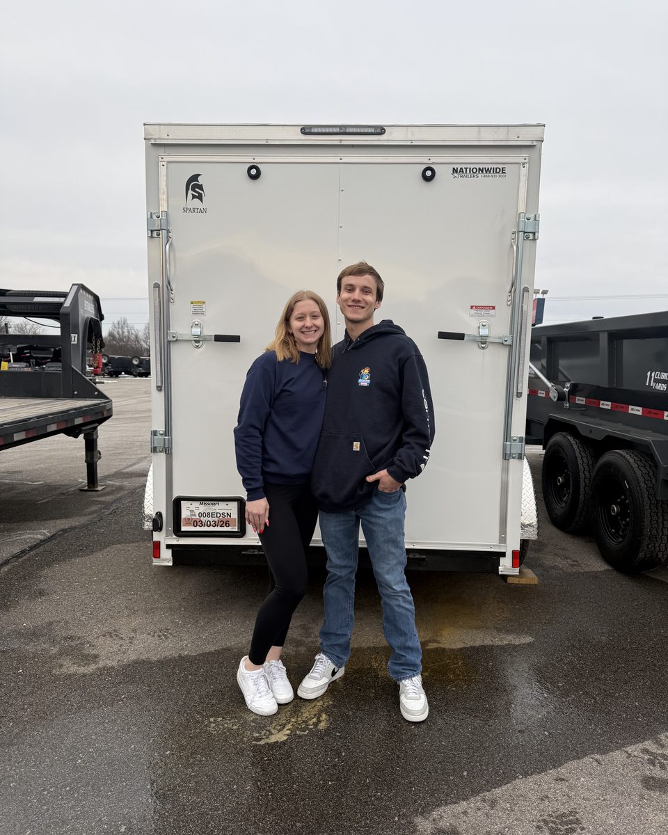 Karson and Renee Kolle, the family behind Duct Daddy, in front of their equipment trailer